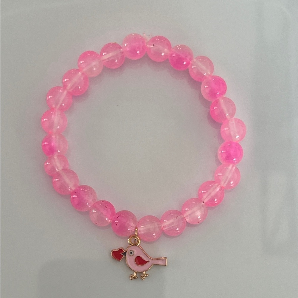 Pink Beaded Bracelet with Bird Charm